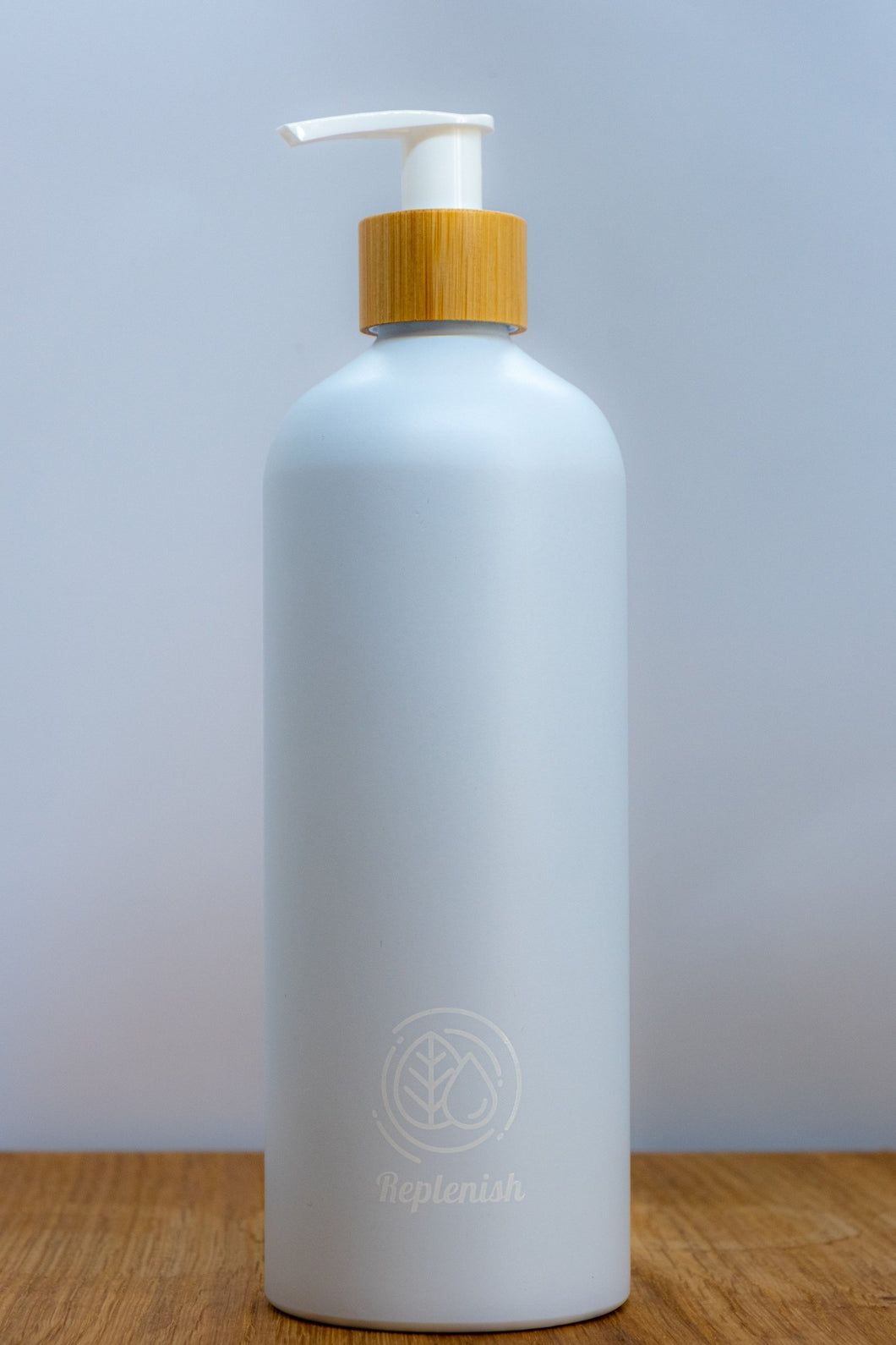 Replenish Bottle with Bamboo Lotion Pump filled with 500ml of Miniml Hair or Body Product