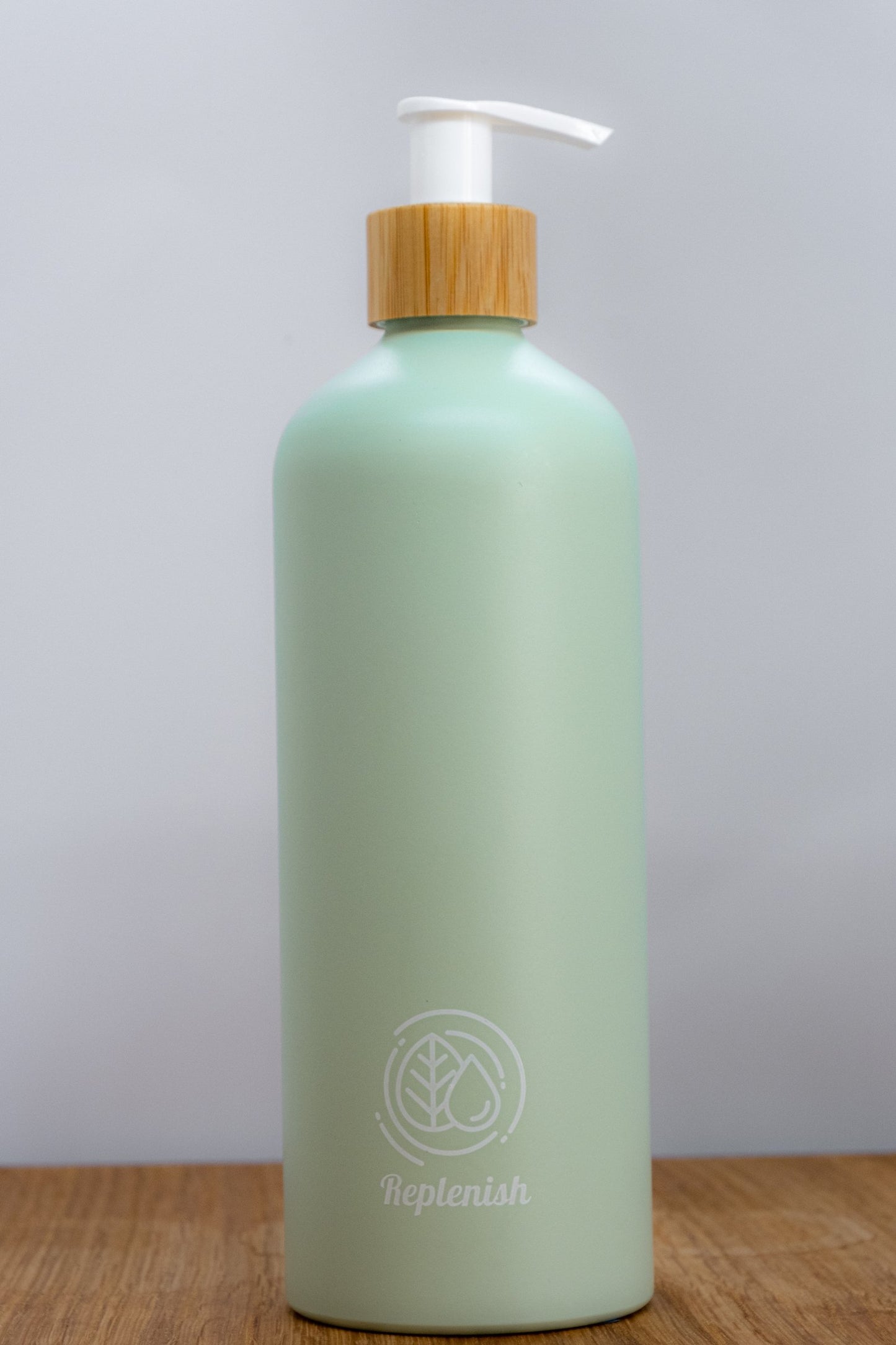 Replenish Bottle with Bamboo Lotion Pump filled with 500ml of Miniml Hair or Body Product